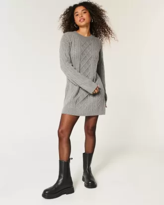 Oversize-Pulloverkleid mit Rundhalsausschnitt und Zopfmuster
