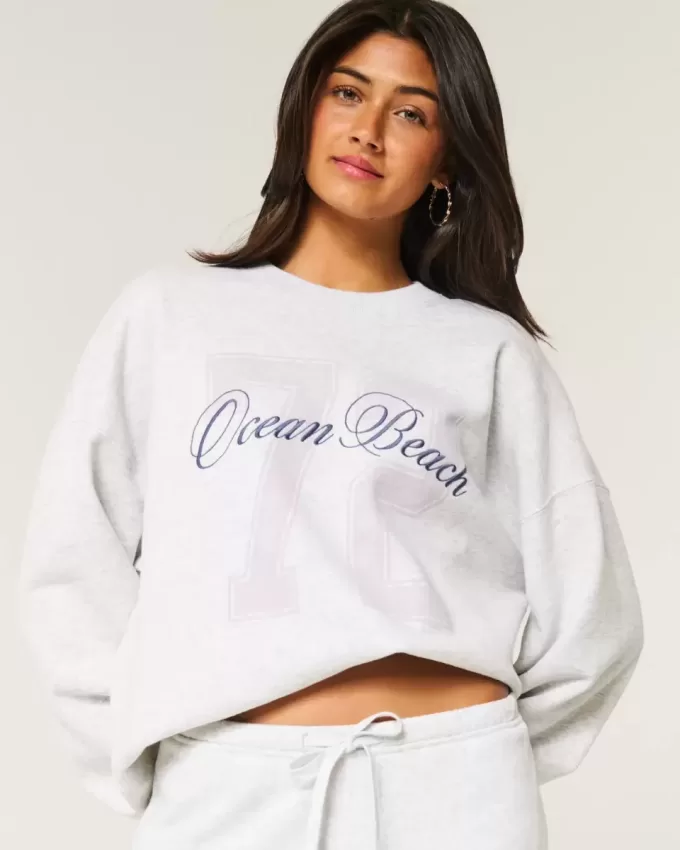 Oversize-Sweatshirt mit Rundhalsausschnitt und Ocean Beach-Grafik Oversize-Sweatshirt mit Rundhalsausschnitt und Ocean Beach-Grafik