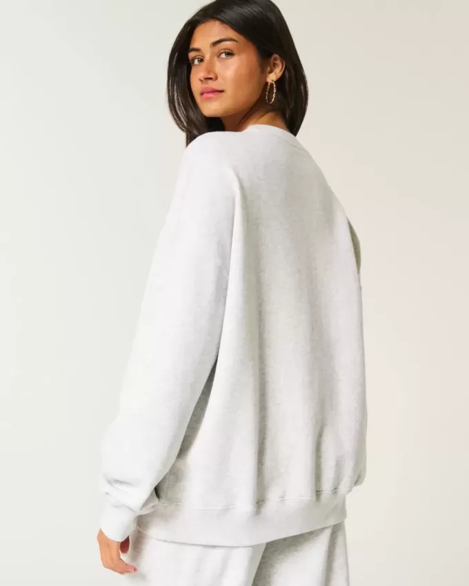 Oversize-Sweatshirt mit Rundhalsausschnitt und Ocean Beach-Grafik Oversize-Sweatshirt mit Rundhalsausschnitt und Ocean Beach-Grafik