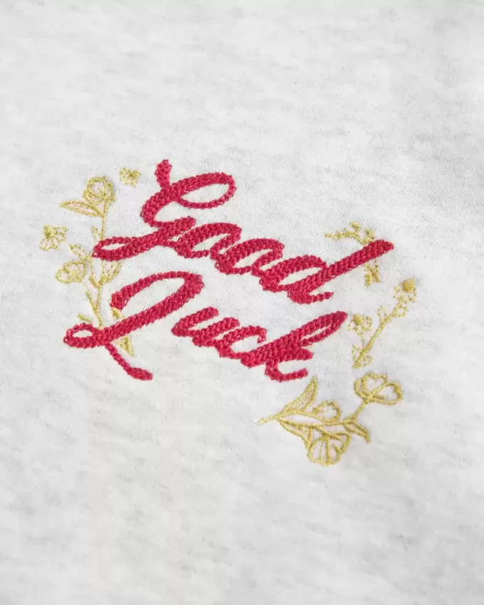 Oversize-Sweatshirt mit schulterfreiem Schnitt und Grafik zum Mondneujahr