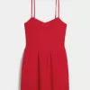Rückenfreies Skort-Kleid aus Leinenmischung Rückenfreies Skort-Kleid aus Leinenmischung