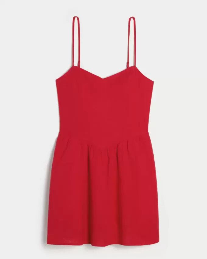Rückenfreies Skort-Kleid aus Leinenmischung Rückenfreies Skort-Kleid aus Leinenmischung