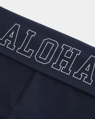 Schlaghose mit Aloha-Grafik und Umschlagbund