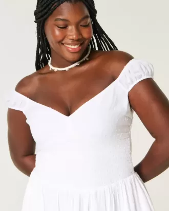 Schulterfreies Minikleid mit asymmetrischem Saum