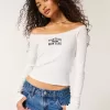 Schulterfreies T-Shirt mit Montauk-Grafik und Spitzenbesatz Schulterfreies T-Shirt mit Montauk-Grafik und Spitzenbesatz