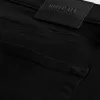 Schwarze, nicht verblassende, sportliche Skinny-Jeans