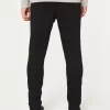Schwarze, nicht verblassende, sportliche Skinny-Jeans