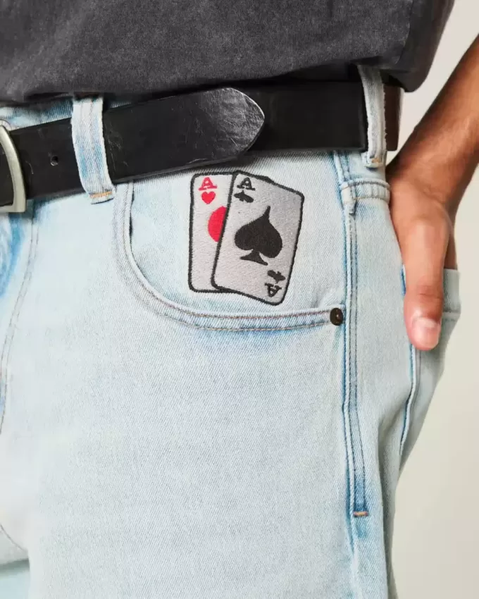 Skater-Baggy-Jeans mit Spielkarten-Grafik in heller Waschung Skater-Baggy-Jeans mit Spielkarten-Grafik in heller Waschung