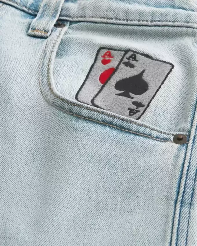 Skater-Baggy-Jeans mit Spielkarten-Grafik in heller Waschung Skater-Baggy-Jeans mit Spielkarten-Grafik in heller Waschung