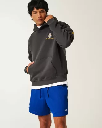 Strick-Fußballshorts mit Logo bis zur Mitte des Oberschenkels