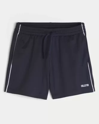 Strick-Fußballshorts mit Logo bis zur Mitte des Oberschenkels