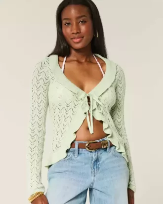 Strickjacke mit Rüschen und Bindeband vorne