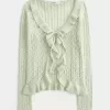 Strickjacke mit Rüschen und Bindeband vorne Strickjacke mit Rüschen und Bindeband vorne