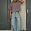 Super Baggy-Jeans mit Astronauten-Grafik in heller Waschung