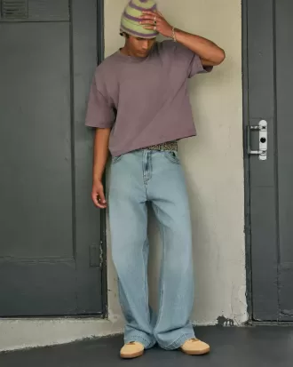Super Baggy-Jeans mit Astronauten-Grafik in heller Waschung