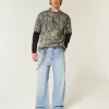 Super Baggy-Jeans mit Astronauten-Grafik in heller Waschung