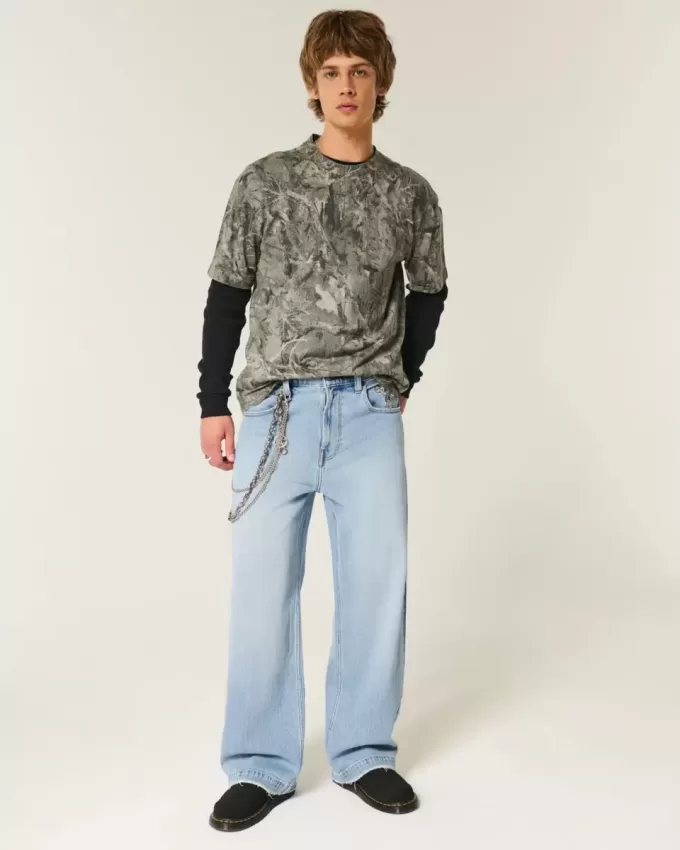 Super Baggy-Jeans mit Astronauten-Grafik in heller Waschung