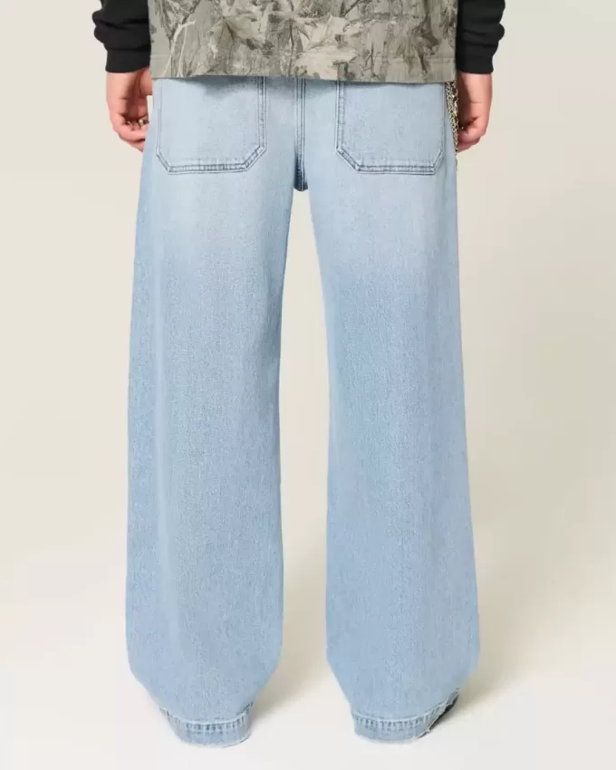 Super Baggy-Jeans mit Astronauten-Grafik in heller Waschung