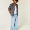 Super Baggy-Jeans mit Spider-Grafik in heller Waschung