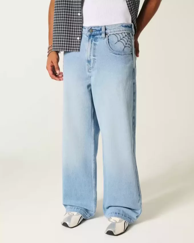 Super Baggy-Jeans mit Spider-Grafik in heller Waschung