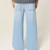 Super Baggy-Jeans mit Spider-Grafik in heller Waschung