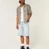 Super Baggy-Jeansshorts mit Würfelgrafik in heller Waschung
