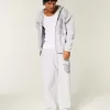 Superweite Jogginghose mit Engel-Grafik