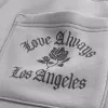 Superweite Jogginghose mit „Los Angeles“-Grafik auf der Rückseite Superweite Jogginghose mit „Los Angeles“-Grafik auf der Rückseite