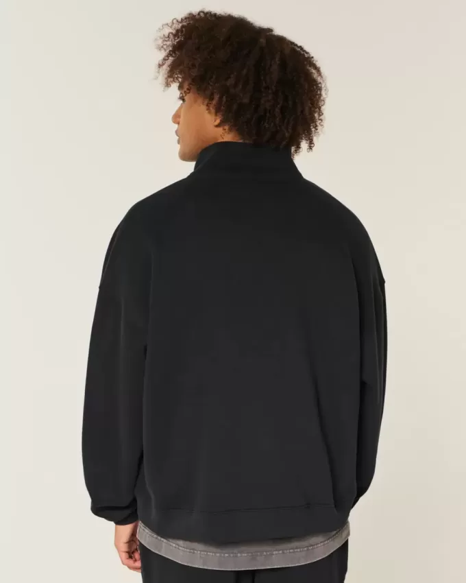 Sweatshirt mit rechteckiger Passform und Viertelreißverschluss Sweatshirt mit rechteckiger Passform und Viertelreißverschluss