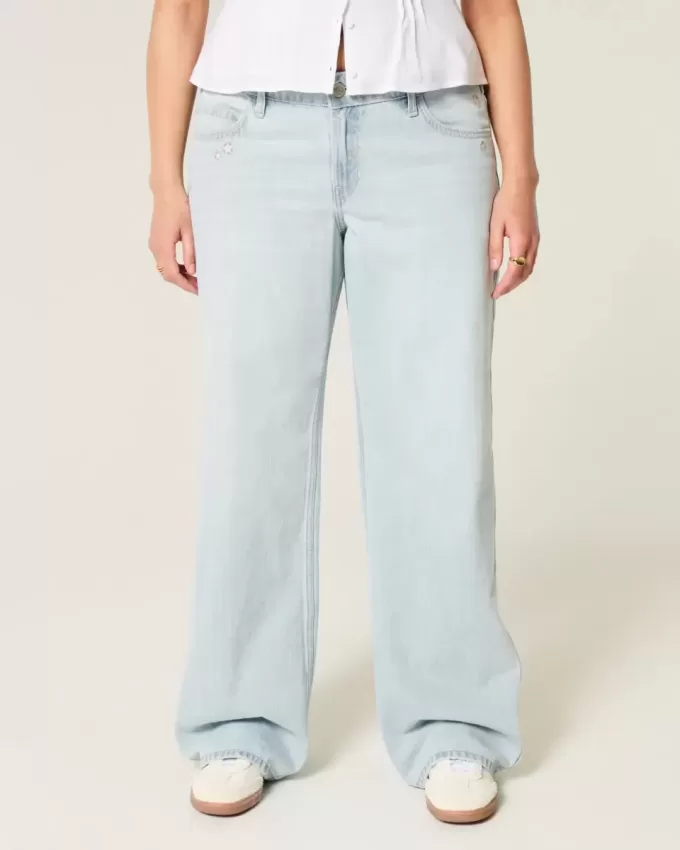 Tief sitzende Baggy-Jeans mit heller Waschung und Sternstickerei