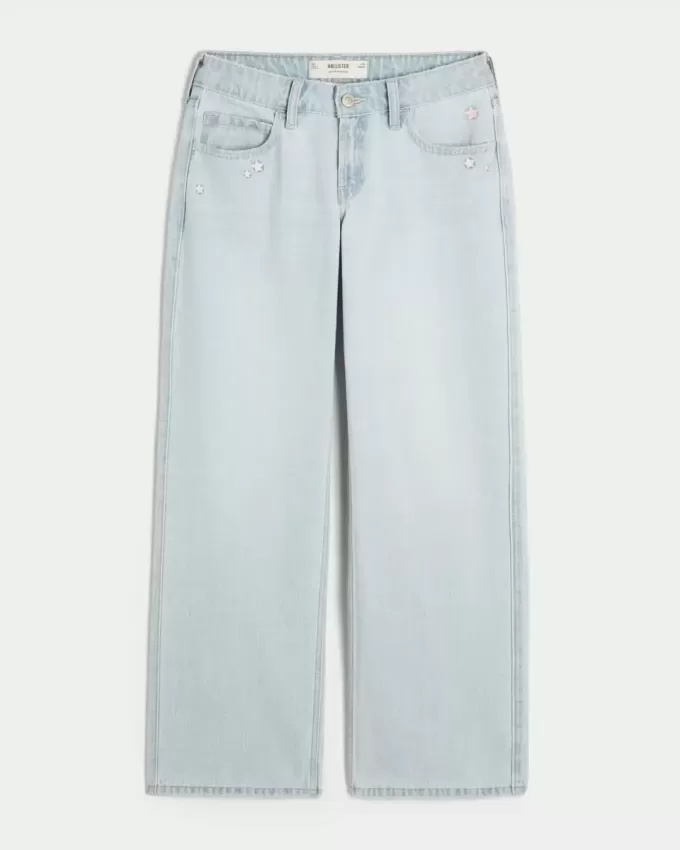 Tief sitzende Baggy-Jeans mit heller Waschung und Sternstickerei