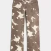 Tief sitzende Baggy-Jeans mit Kuh-Print Tief sitzende Baggy-Jeans mit Kuh-Print
