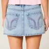 Tief sitzender Mini-Skort aus rosa besticktem Denim in heller Waschung