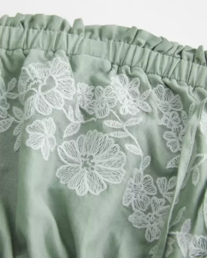 Trägerloses Babydoll-Kleid mit Stickerei