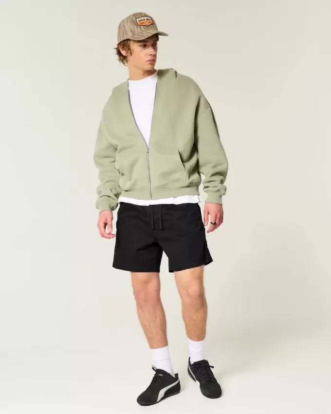 Twill-Shorts zum Überziehen bis zur Mitte des Oberschenkels Twill-Shorts zum Überziehen bis zur Mitte des Oberschenkels