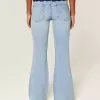 Ultra Low-Rise Distressed Light Wash Flare Jeans mit Pailletten