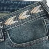 Ultra Low-Rise Schlagjeans mit mittlerer Waschung und Stickerei
