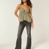 Ultra Low-Rise verwaschene schwarze Schlagjeans