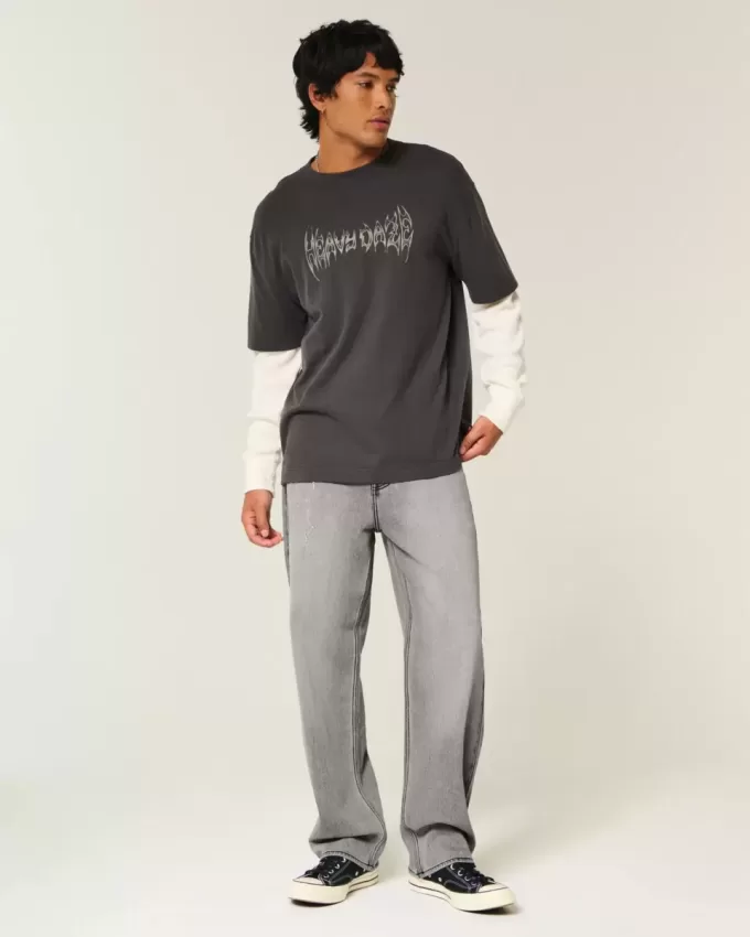 Verwaschene schwarze Baggy-Jeans mit Grafik und Verzierung Verwaschene schwarze Baggy-Jeans mit Grafik und Verzierung