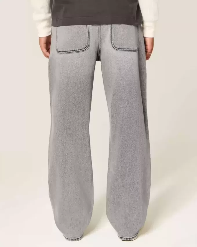 Verwaschene schwarze Baggy-Jeans mit Grafik und Verzierung Verwaschene schwarze Baggy-Jeans mit Grafik und Verzierung