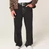 Verwaschene schwarze Baggy-Jeans mit Nieten