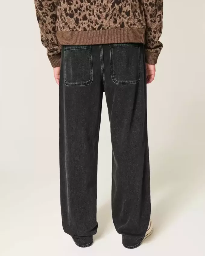 Verwaschene schwarze Baggy-Jeans mit Nieten