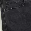 Verwaschene schwarze Baggy-Jeans mit Nieten