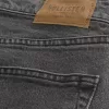 Verwaschene schwarze, lockere Jeans