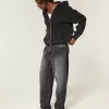 Verwaschene schwarze Skater-Baggy-Jeans mit Logo-Grafik