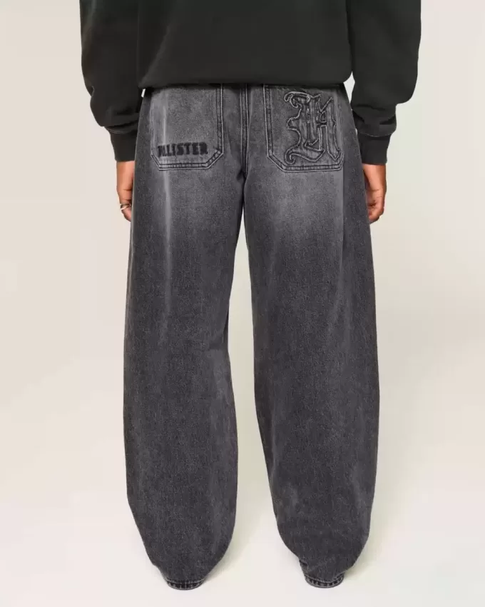Verwaschene schwarze Skater-Baggy-Jeans mit Logo-Grafik