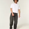 Verwaschene schwarze Skater-Baggy-Jeans mit Schlangenstickerei