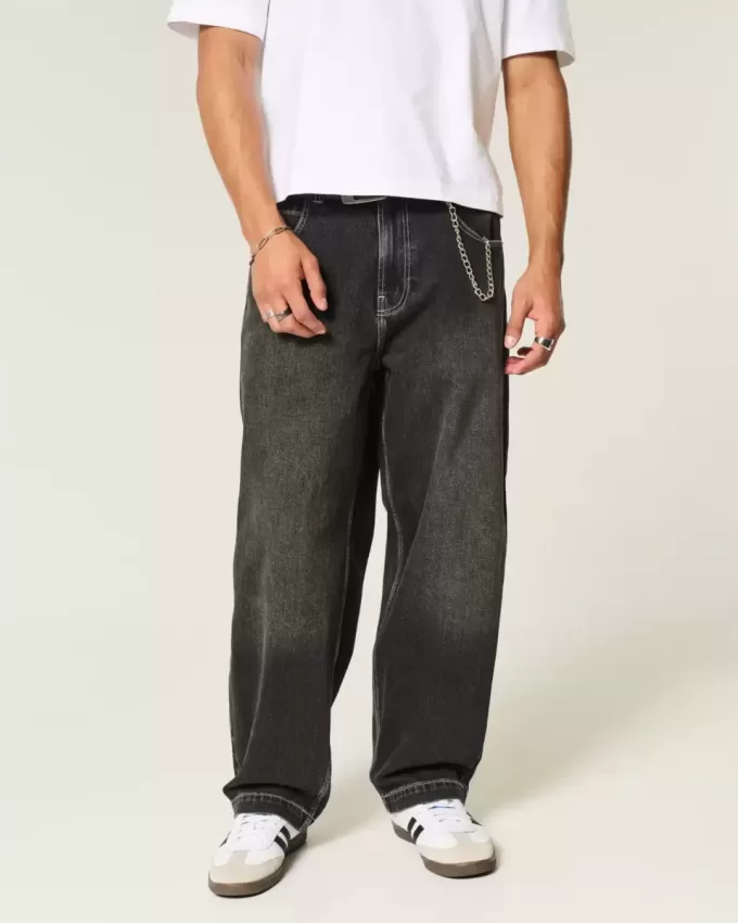 Verwaschene schwarze Skater-Baggy-Jeans mit Schlangenstickerei
