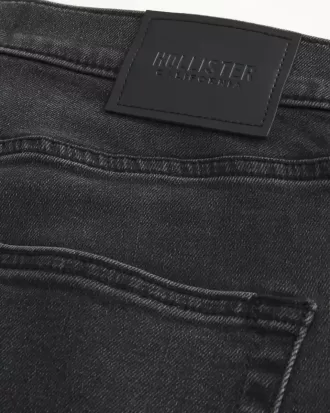 Verwaschene schwarze, sportliche Skinny-Jeans