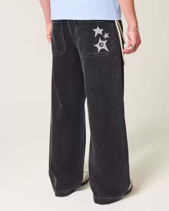 Verwaschene schwarze Super Baggy-Jeans mit Sterngrafik